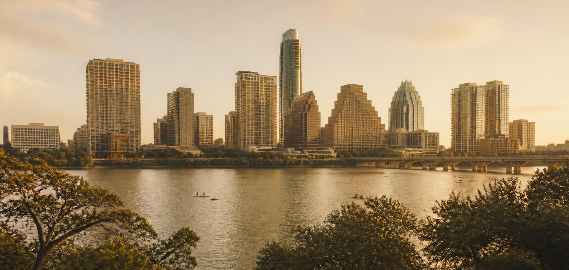 The downtown Austin skyline at golden hour seen across Lady Bird Lake